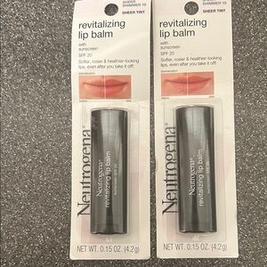 Neutrogena revitalizing lip balm. SPF 20. Sheer Shimmer Sheer Tint. Two pack.